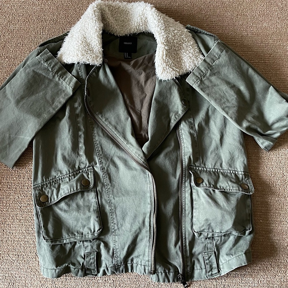 Green denim jacket like new.